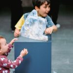 Children exploring a museum exhibit for the Fujisan Radar Dome summer learning event