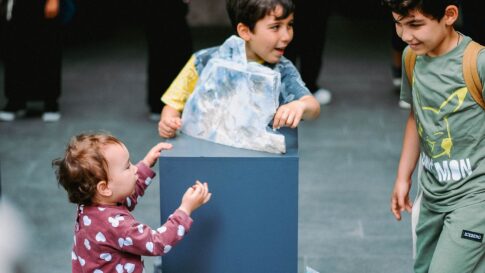 Children exploring a museum exhibit for the Fujisan Radar Dome summer learning event