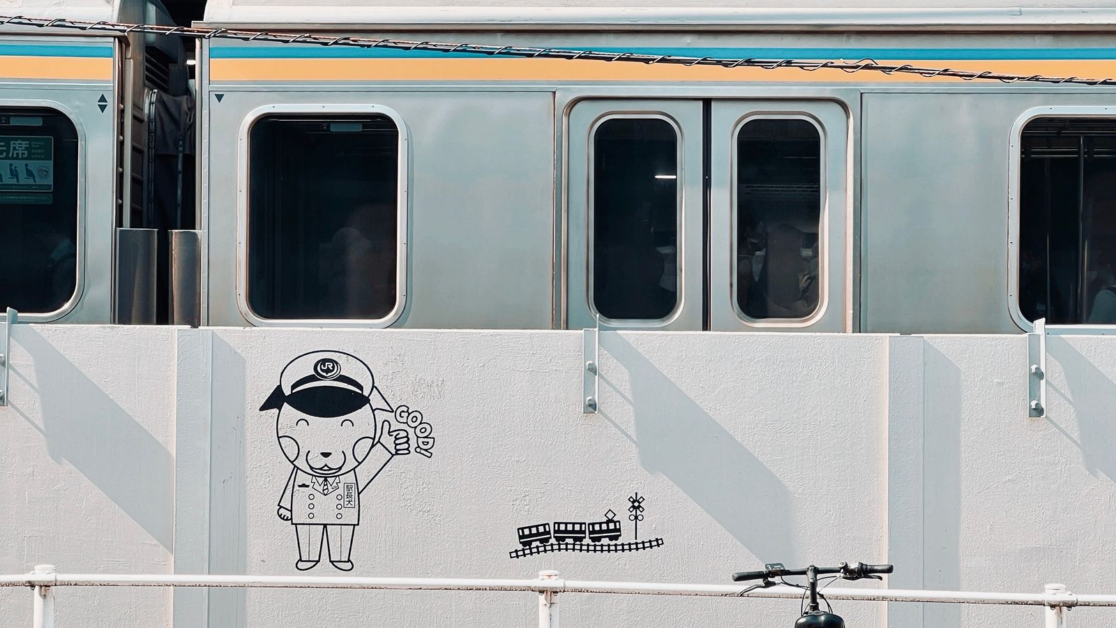 A Japanese train station scene with local details for Fuji Five Lakes Local Transport 2026: Trains, Buses, and Car-Free Lake Days