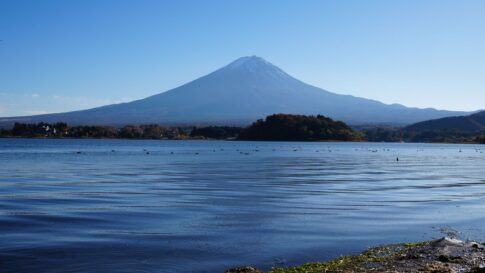 Mount Fuji framed by Lake Kawaguchiko and low clouds for Mt. Fuji Weather Turnaround Guide: When to Stop, Wait, or Change Plans