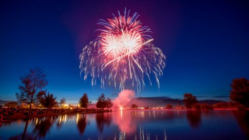 Fireworks reflected on a lake for the Yamanakako Hoko Festival parking and viewing update