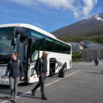 Travelers arriving by highway coach at the Fuji Subaru Line 5th Station
