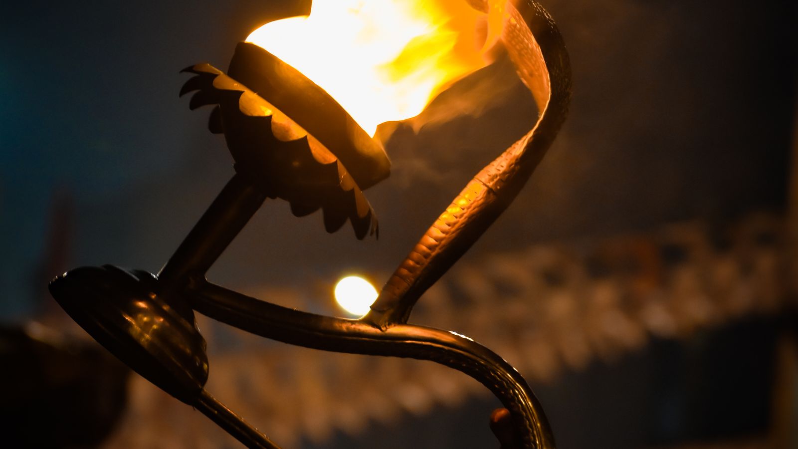 A burning torch at night for the Yoshida Fire Festival schedule update