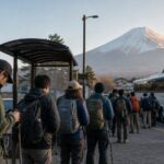 Hikers waiting for an early bus toward the Fuji Subaru Line 5th Station from Kawaguchiko
